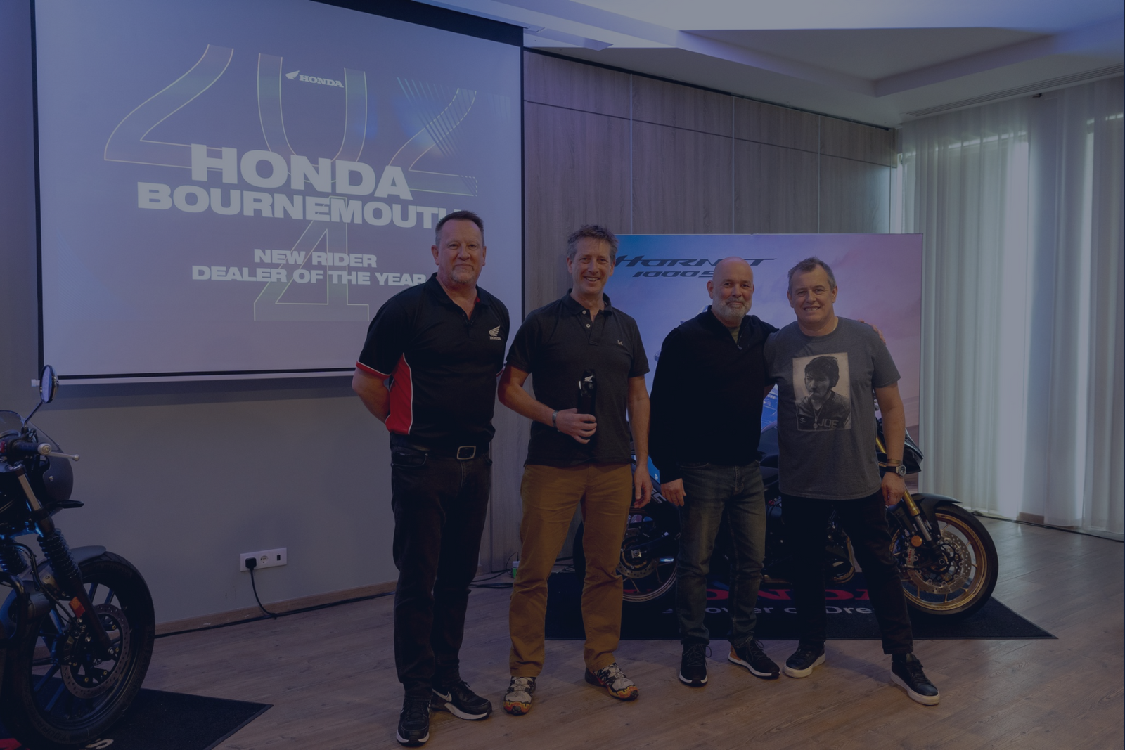 Honda of Bournemouth win new rider dealer of the year at the honda dealer conference in portugal